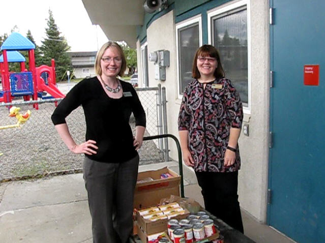 Food Pantry Donation to Joy Elementary Sarah Geer with Lalunie Whisenhunt, dropping off a food pantry donation to Joy Elementary